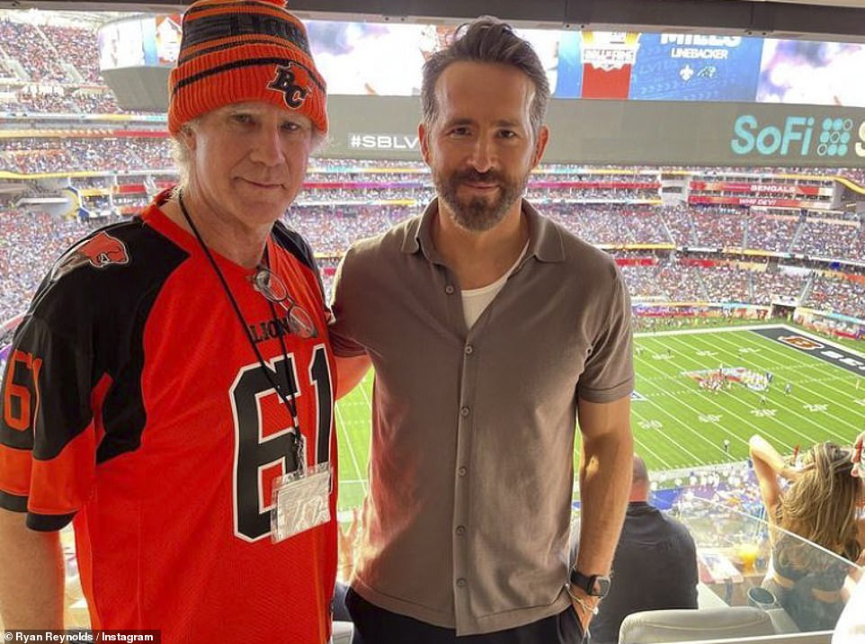 Will Ferrell and Ryan Reynolds pose for a photograph as they attend the Super Bowl together in Los Angeles