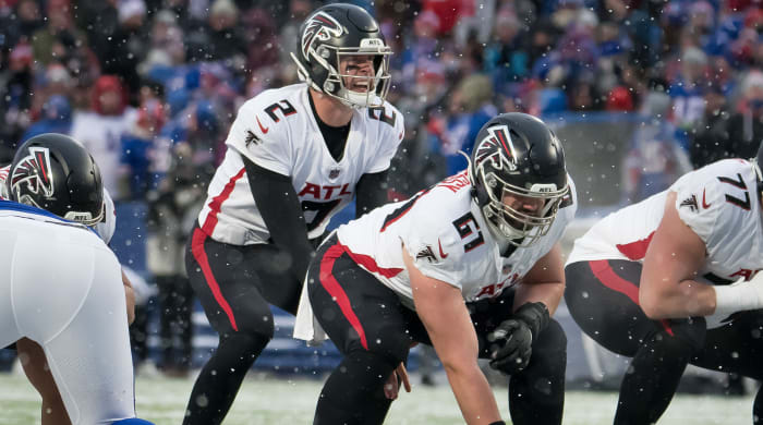 Atlanta Falcons quarterback Matt Ryan (2) and center Matt Hennessy (61) at the line of scrimmage in the fourth quarter against the Buffalo Bills at Highmark Stadium.
