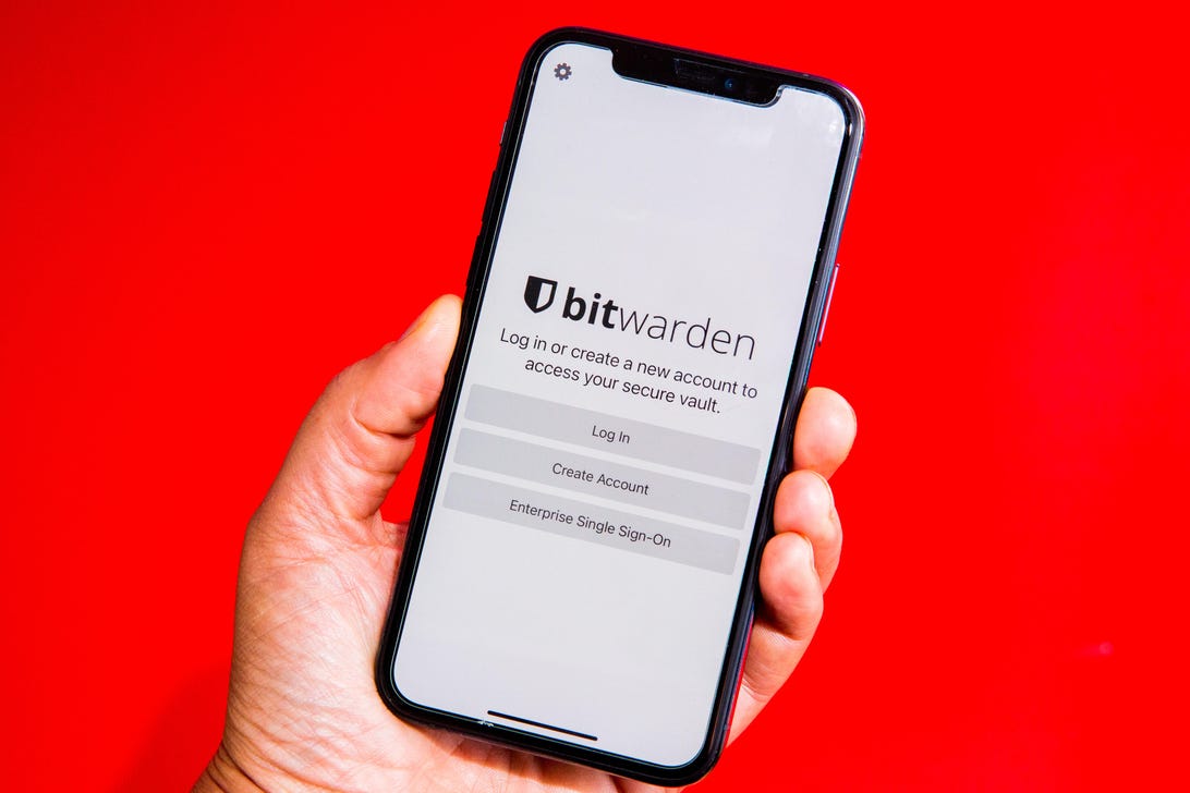 Bitwarden login screen against a red background