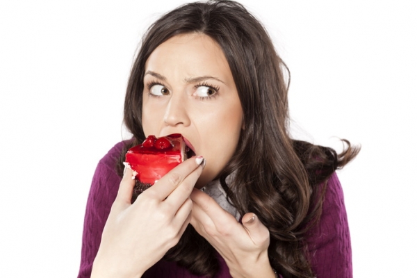 GettyImages-VladamirFLloyd cake eating junk food